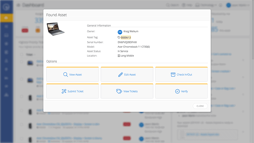 A dialog box displays detailed asset information for an Acer Chromebook 11, with options to view, edit, submit tickets, check in/out, or verify. Asset tag: 0000613, Serial Number: DN6FVQ2BDFHW.