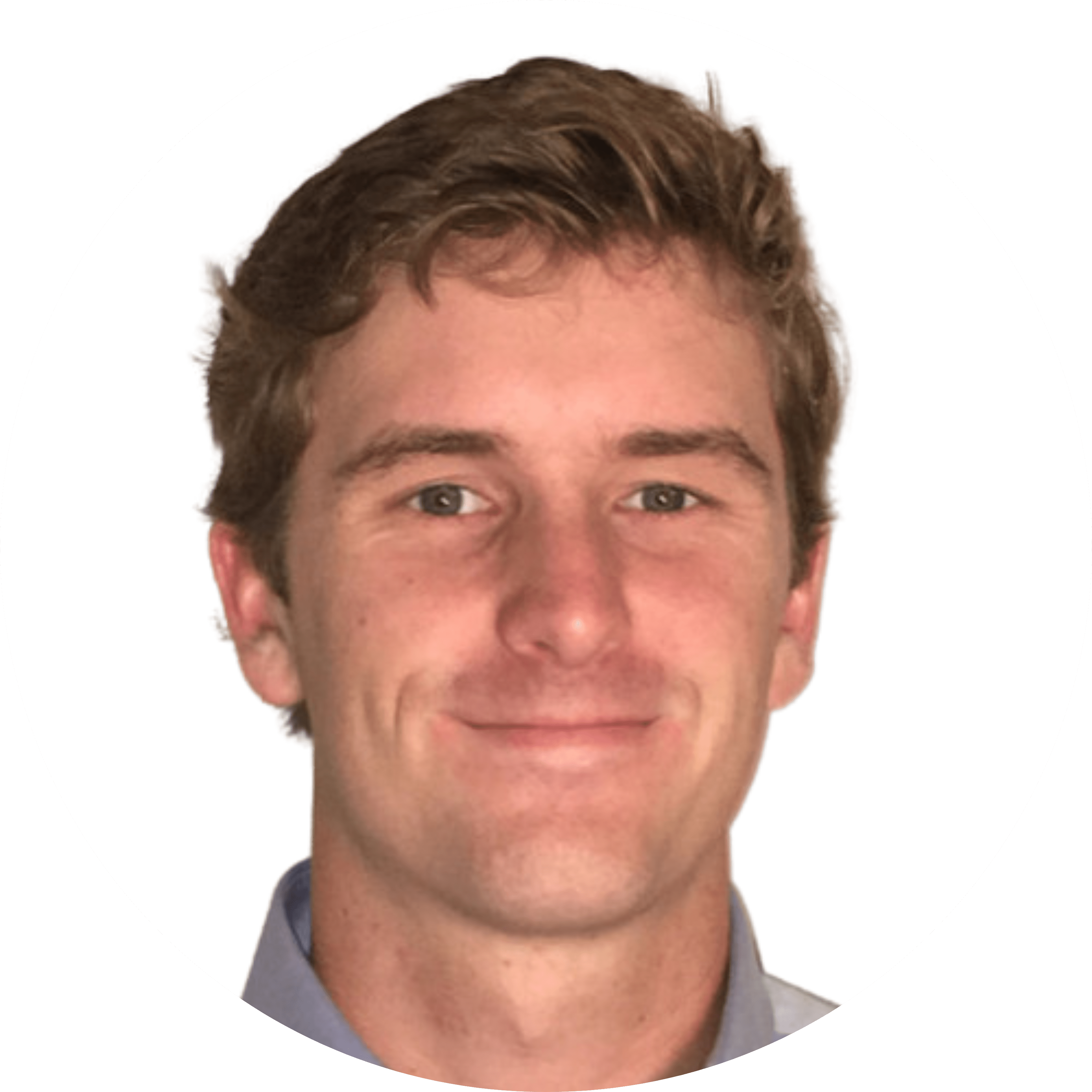 A person with short, light brown hair, wearing a collared shirt, smiles slightly against a plain white background within a circular frame.