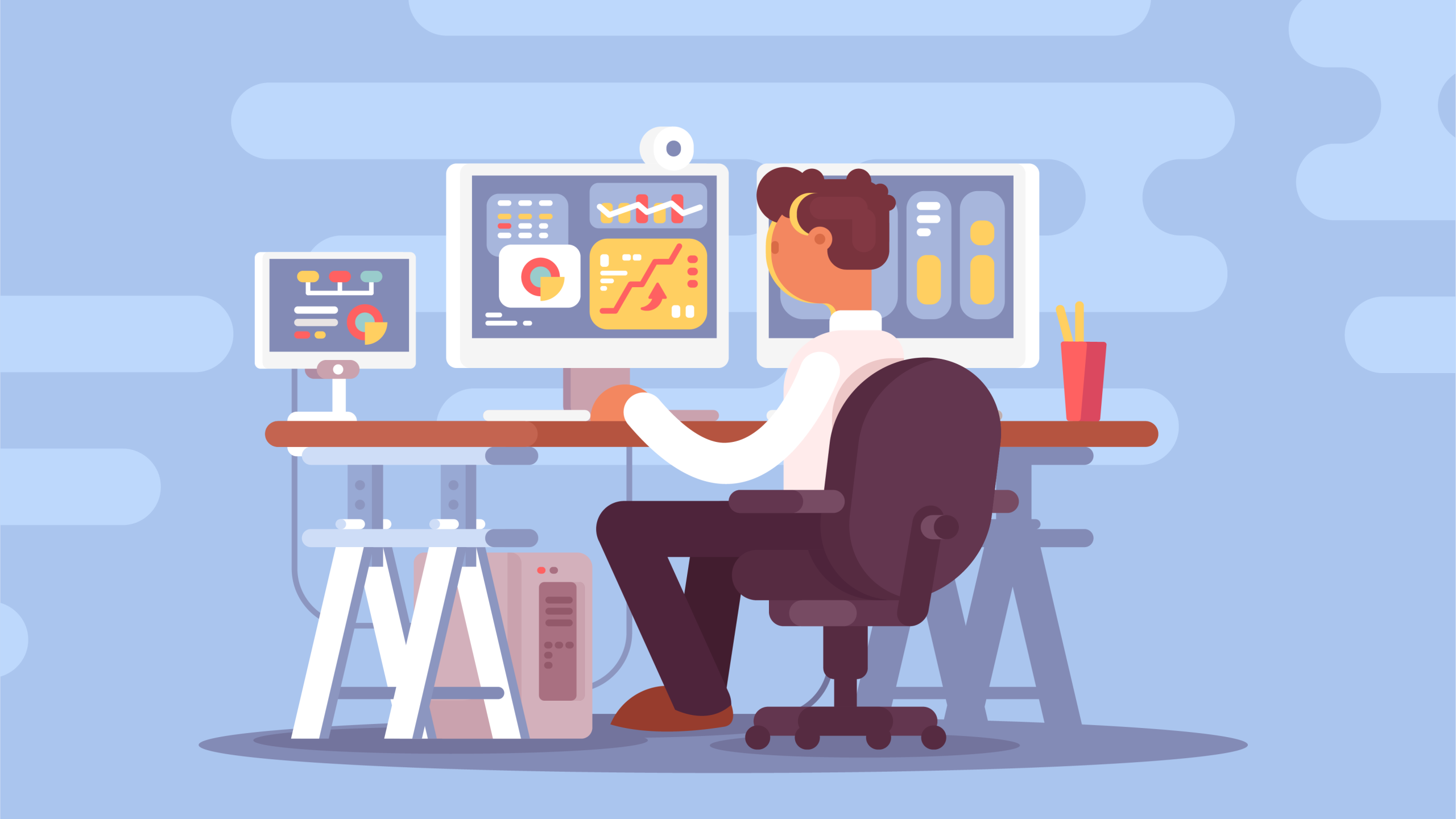 Man sitting at his desk on his computer